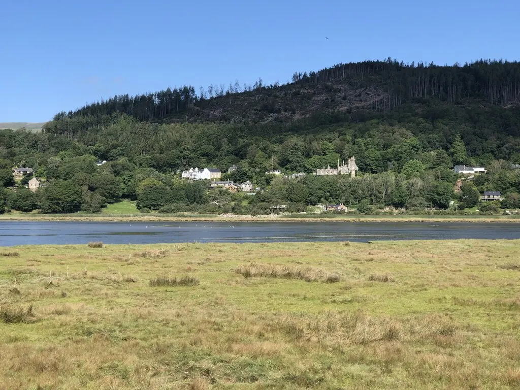 Bontddu and its wooded hillside across the Mawddach estuary
